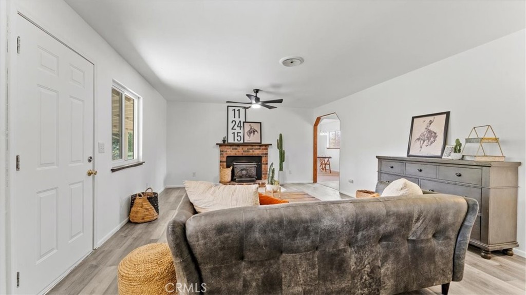 112 Los Verjeles Road Bangor, CA 95901 - Photo 16 of 48 a bed room with a bed and a chandelier