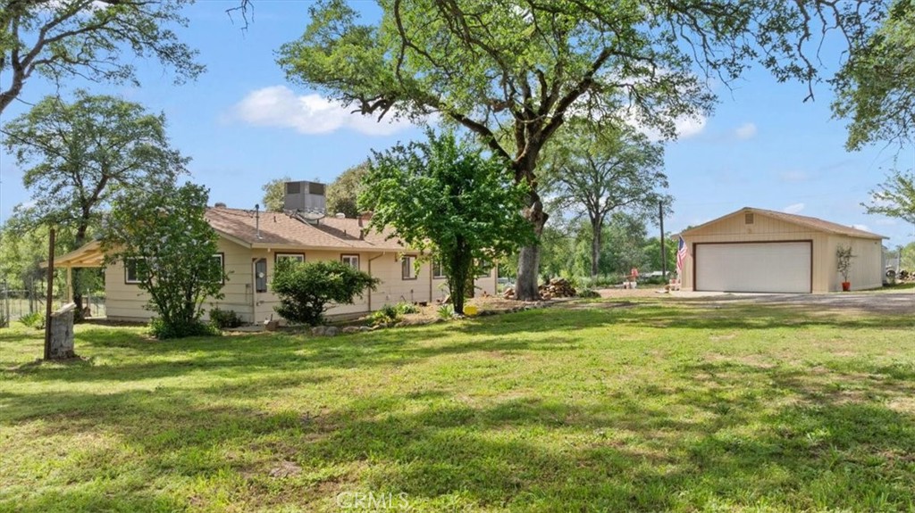 112 Los Verjeles Road Bangor, CA 95901 - Photo 2 of 48 a yellow house in middle of the forest