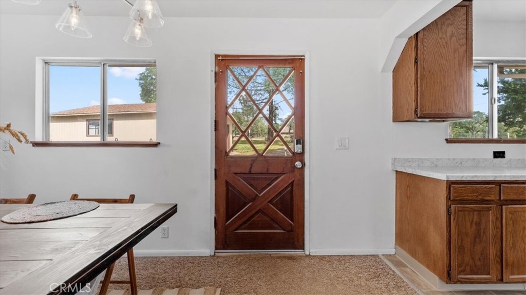 112 Los Verjeles Road Bangor, CA 95901 - Photo 27 of 48 a bathroom with a sink a mirror and a window