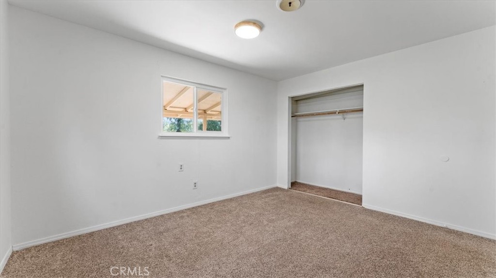 112 Los Verjeles Road Bangor, CA 95901 - Photo 39 of 48 an empty room with windows and closet