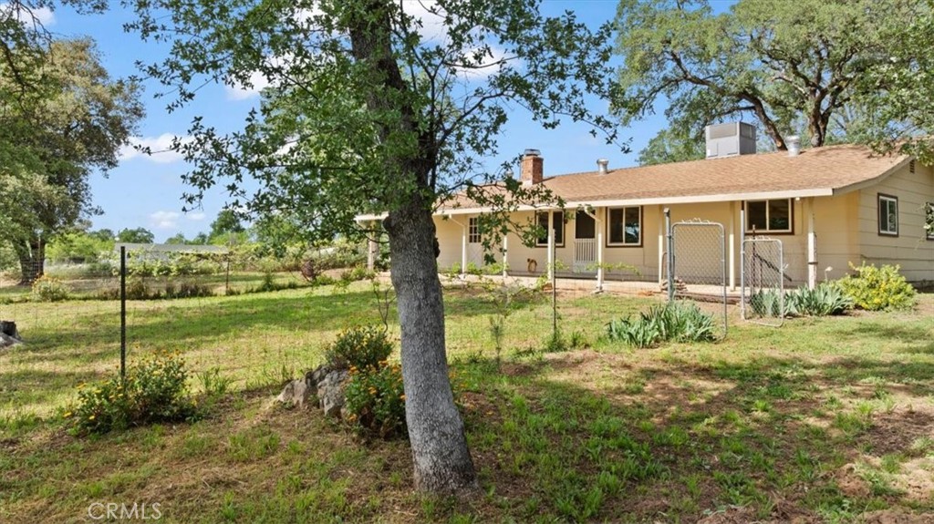 112 Los Verjeles Road Bangor, CA 95901 - Photo 45 of 48 a view of a house with yard and a garden