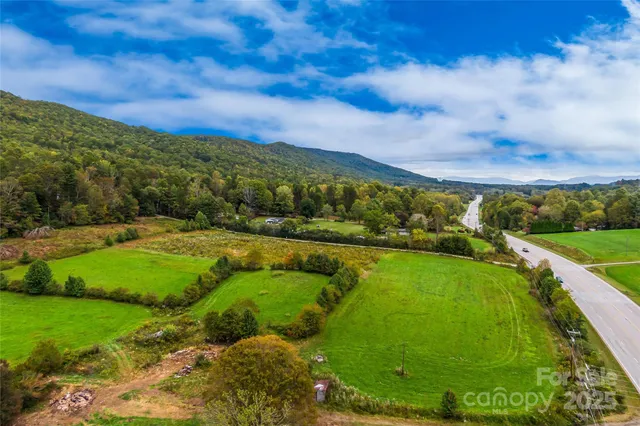 a view of a golf course with a lake