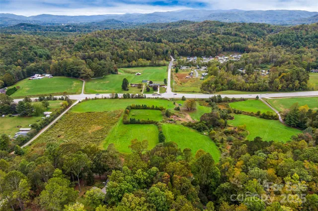 a view of a golf course with a lake