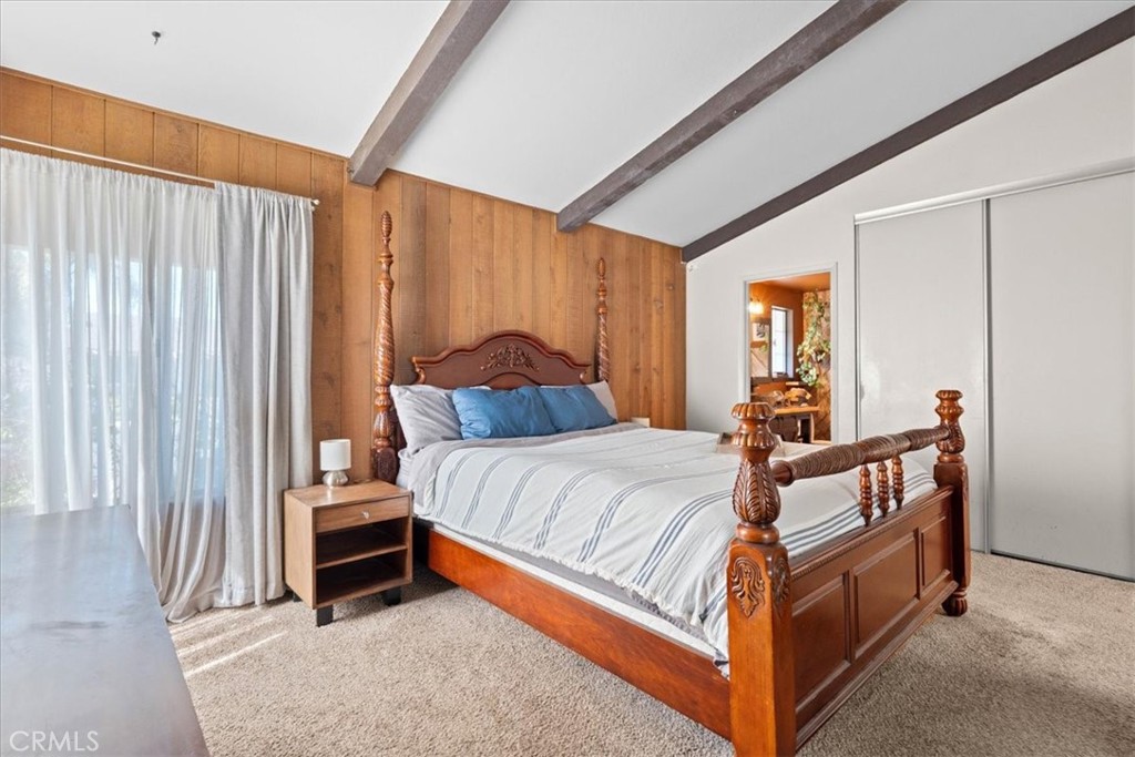 222 Village Square Fillmore, CA 93015 - Photo 15 of 39 a bed sitting in a bedroom next to a window