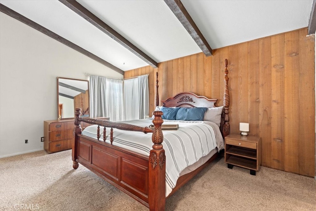 222 Village Square Fillmore, CA 93015 - Photo 16 of 39 a bed sitting in a spacious bedroom next to a window