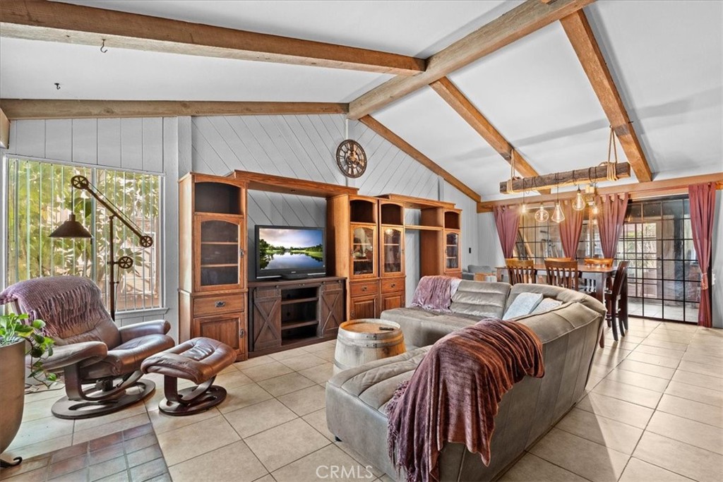 222 Village Square Fillmore, CA 93015 - Photo 7 of 39 a outdoor living space with furniture potted plant and a large window