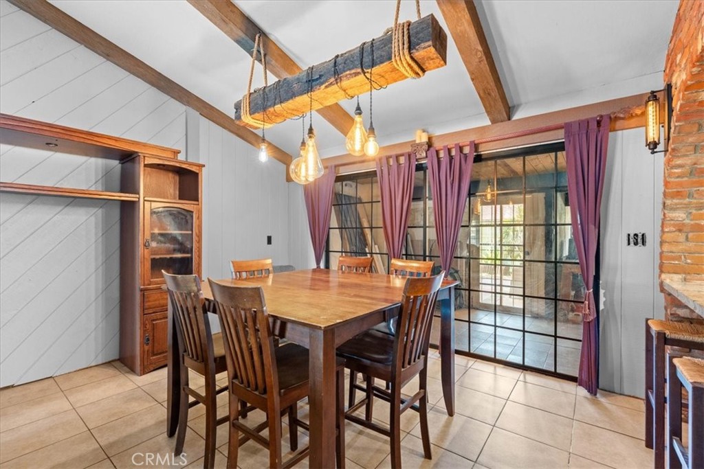 222 Village Square Fillmore, CA 93015 - Photo 8 of 39 a view of a patio with table and chairs and potted plants