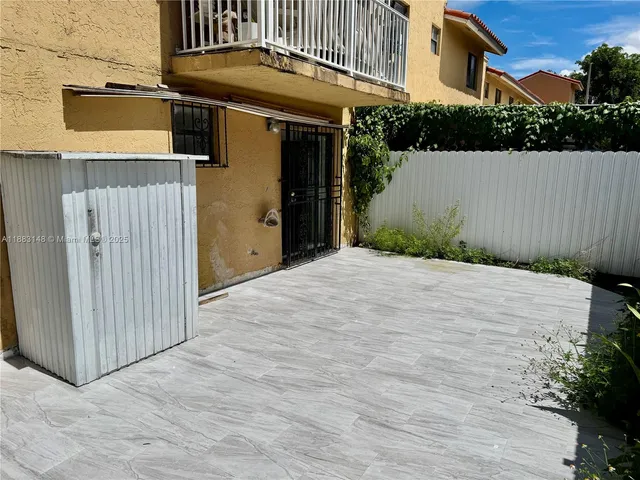 a view of a house with a garage