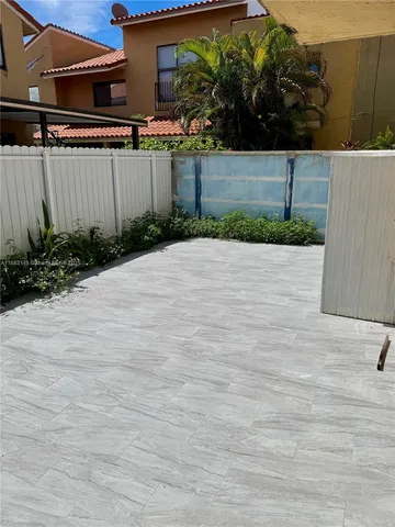 a street view with wooden fence
