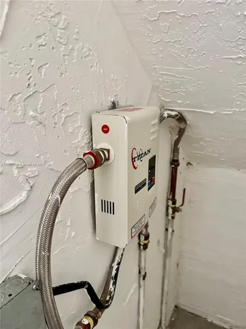 a bathroom with a bathtub and shower