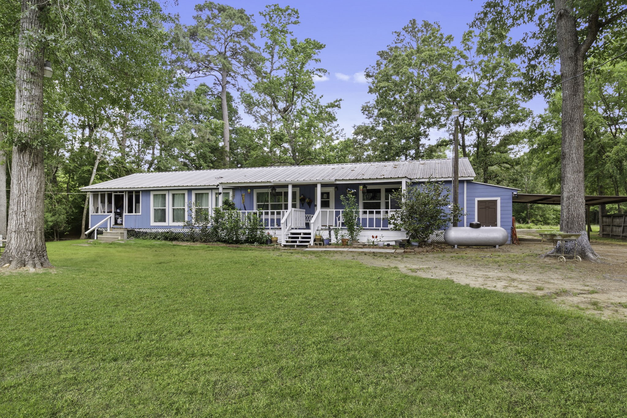 front view of a house with a yard