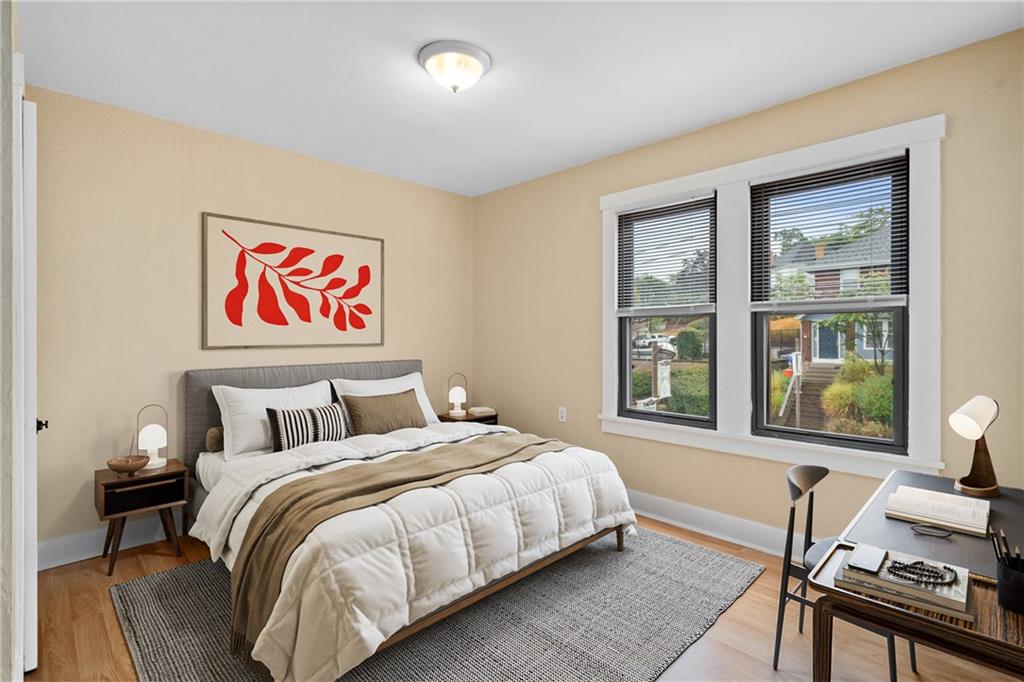 3612 Main Street Homestead, PA 15120 - Photo 19 of 33 a bedroom with a bed and a window