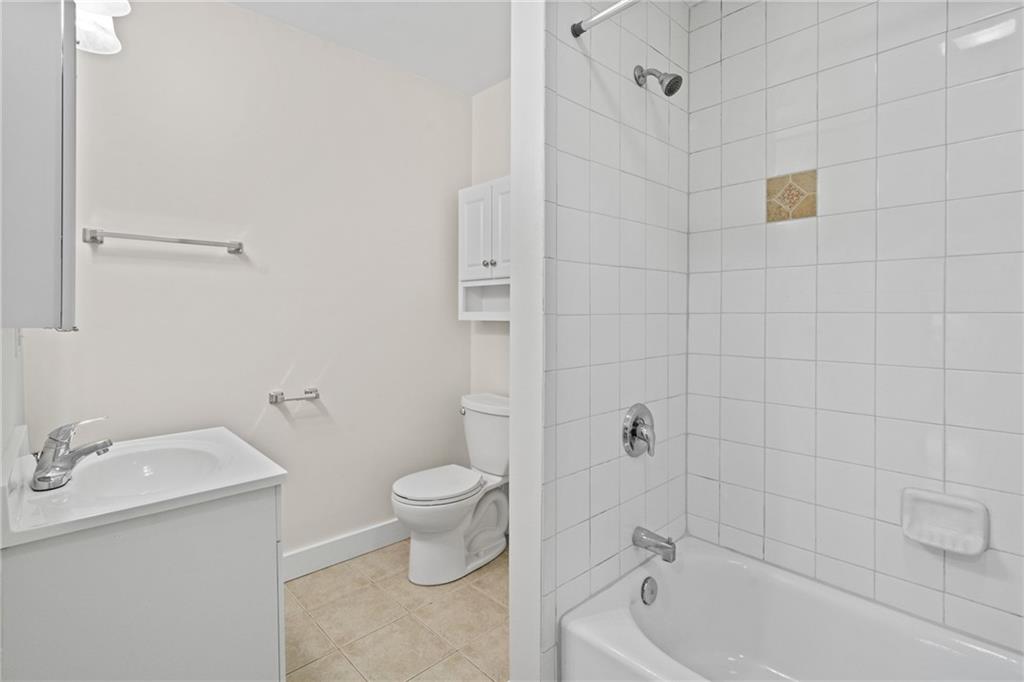 3612 Main Street Homestead, PA 15120 - Photo 23 of 33 a bath room with a toilet sink and shower