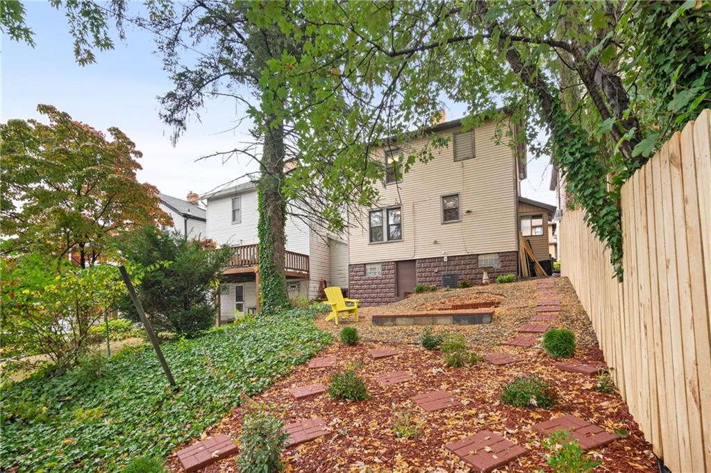 3612 Main Street Homestead, PA 15120 - Photo 29 of 33 a view of a white house with a large tree