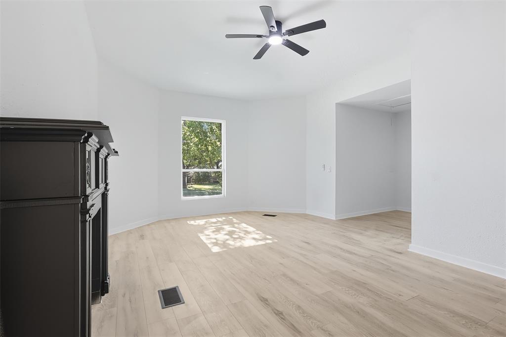 605 North Main Street Winnsboro, TX 75494 - Photo 12 of 29 a view of an empty room with a window
