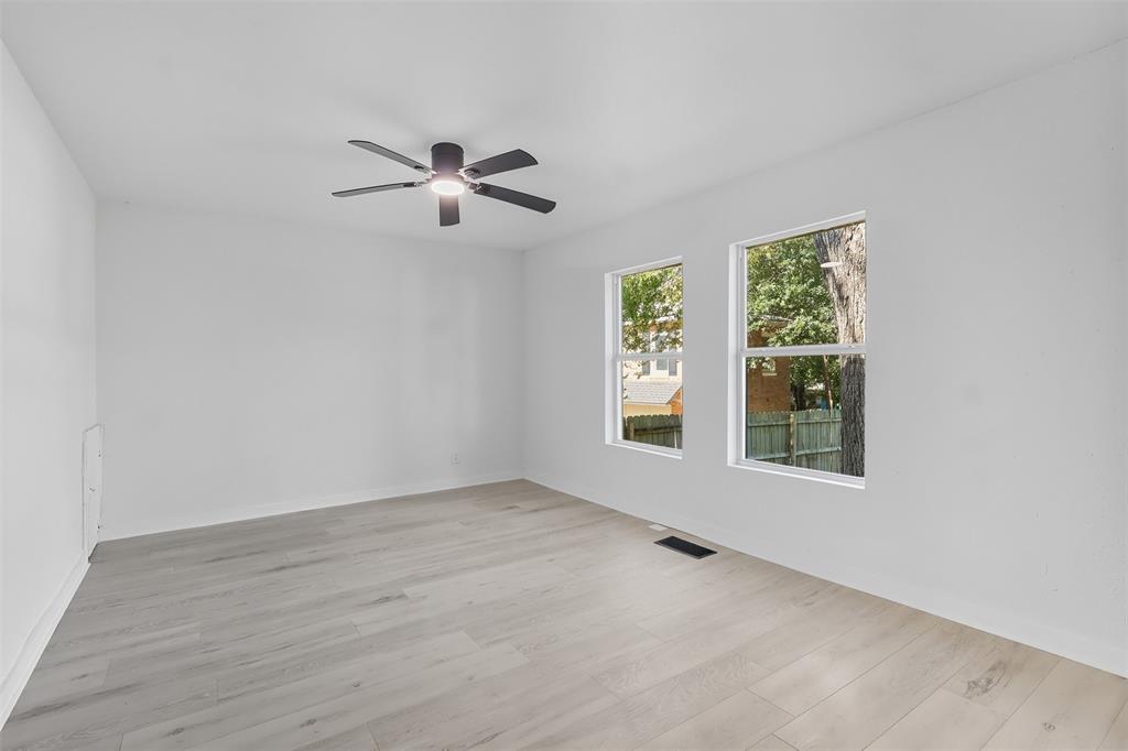605 North Main Street Winnsboro, TX 75494 - Photo 16 of 29 a view of an empty room with a window