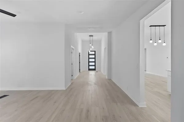 wooden floor and windows in a room