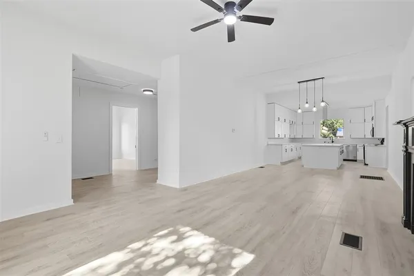 a view of an empty room and window