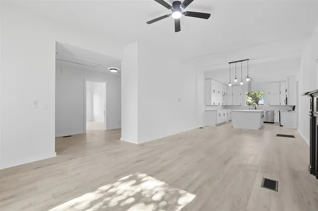 a view of an empty room and window