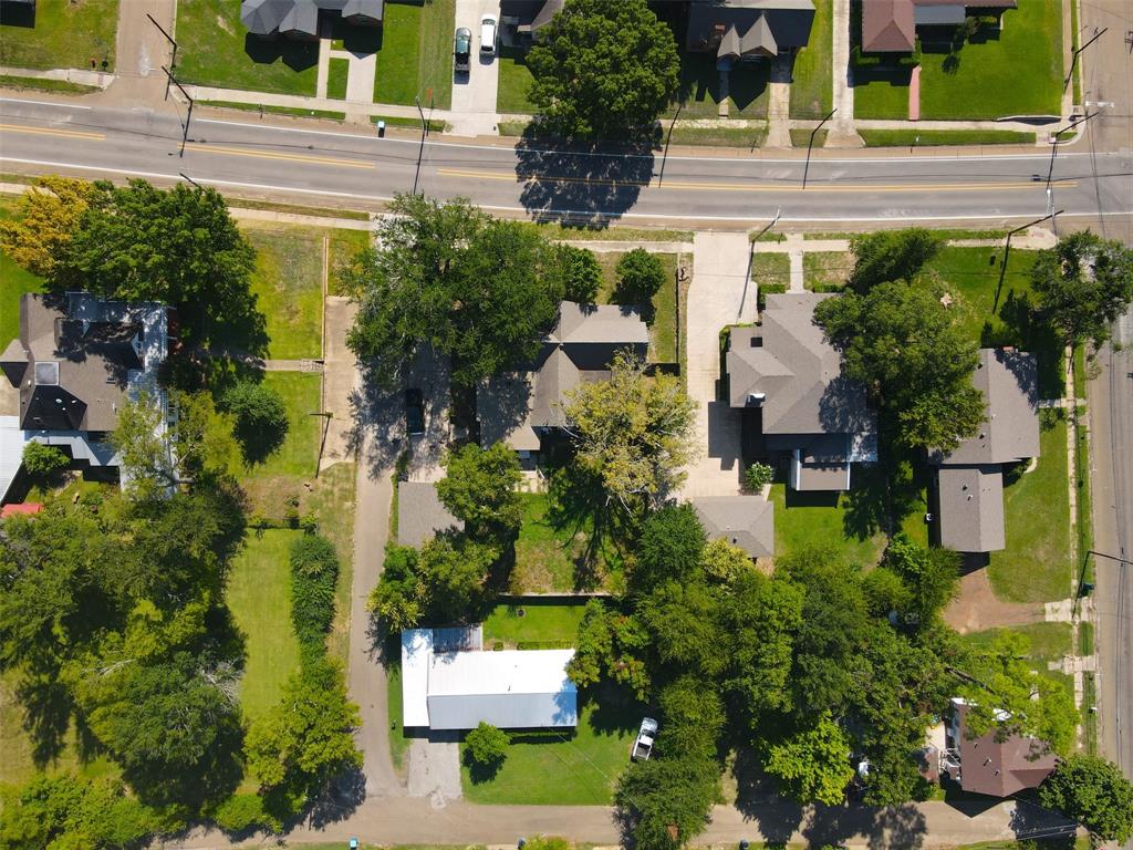 605 North Main Street Winnsboro, TX 75494 - Photo 28 of 29 an aerial view of a house with a yard garden and swimming pool