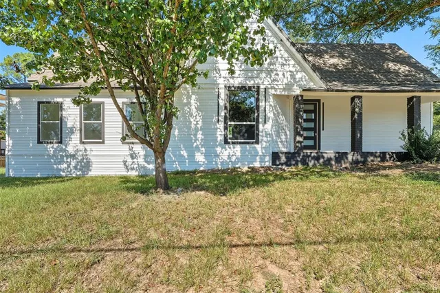 front view of house with a yard