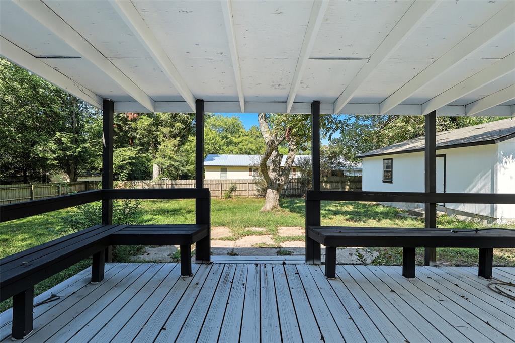 605 North Main Street Winnsboro, TX 75494 - Photo 10 of 29 a view of chairs in balcony with wooden floor
