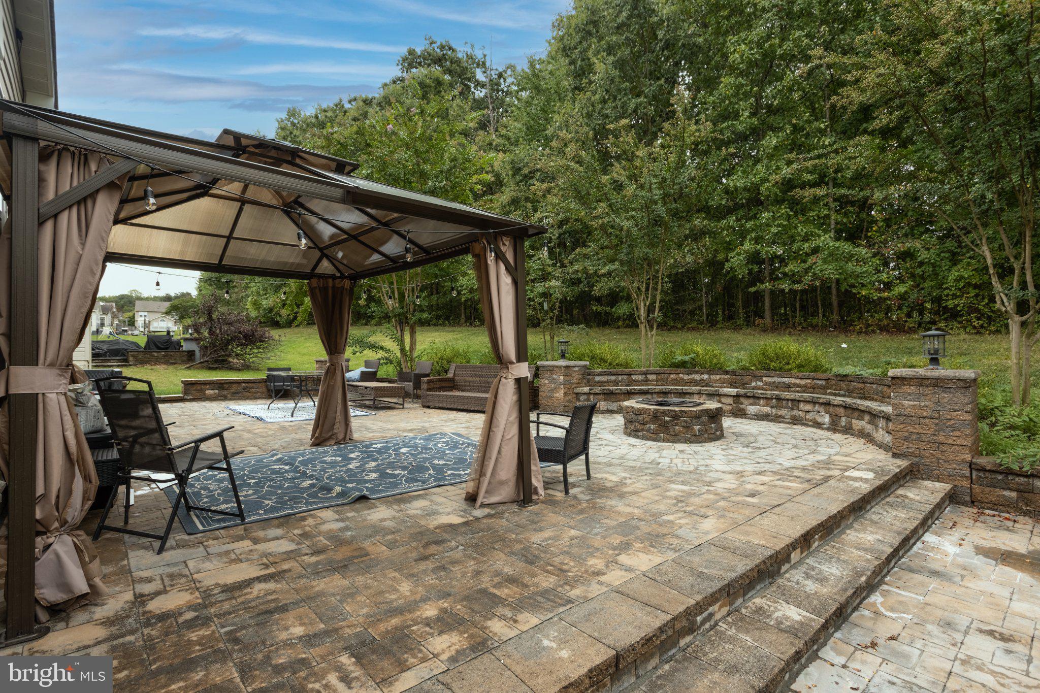 7777 Rotherham Drive Hanover, MD 21076 - Photo 58 of 73 Outdoor patio with view to the woods