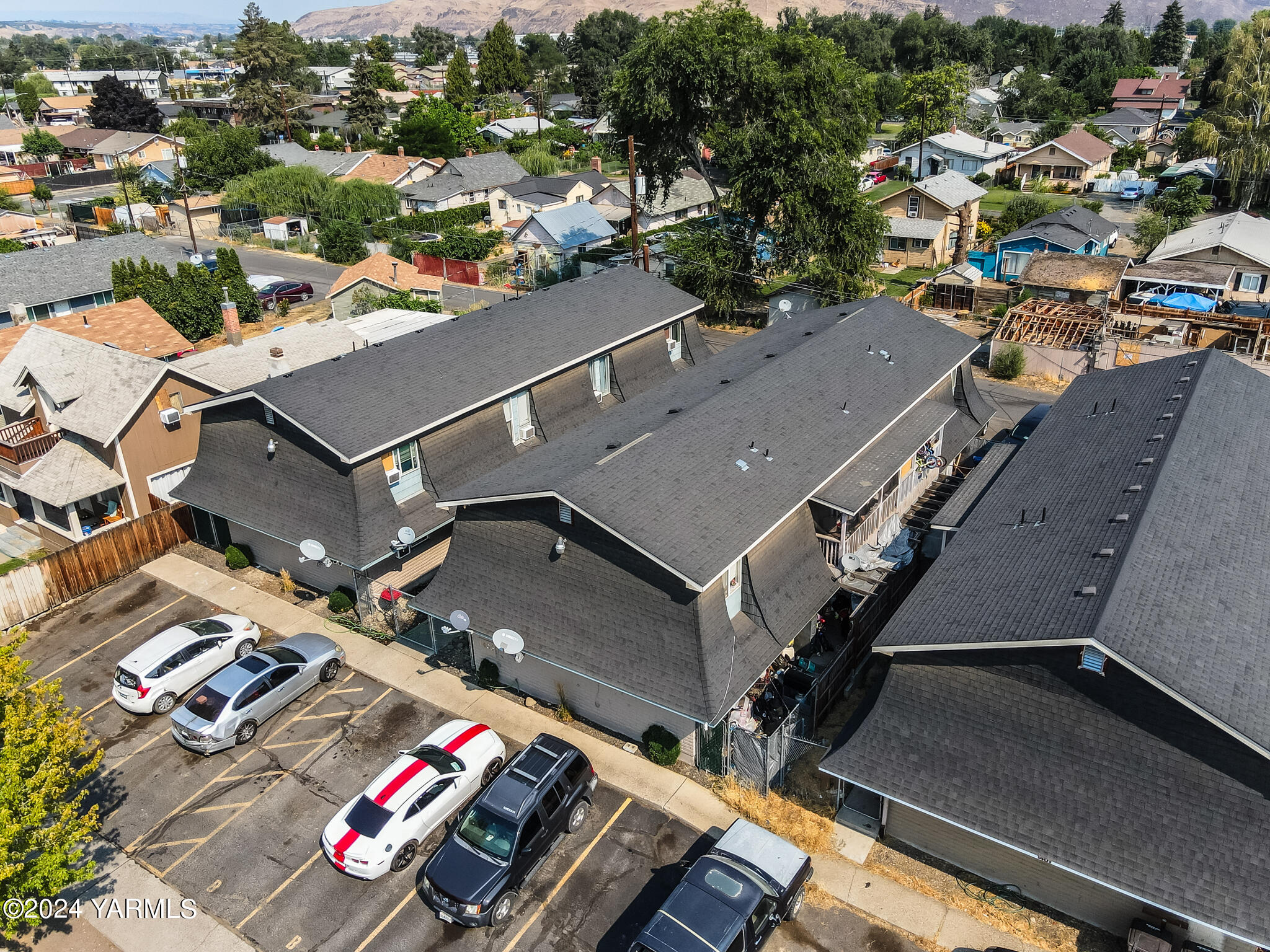 1403-1405 Roosevelt Avenue Yakima, WA 98902 - Photo 3 of 14 an aerial view of residential houses with outdoor space