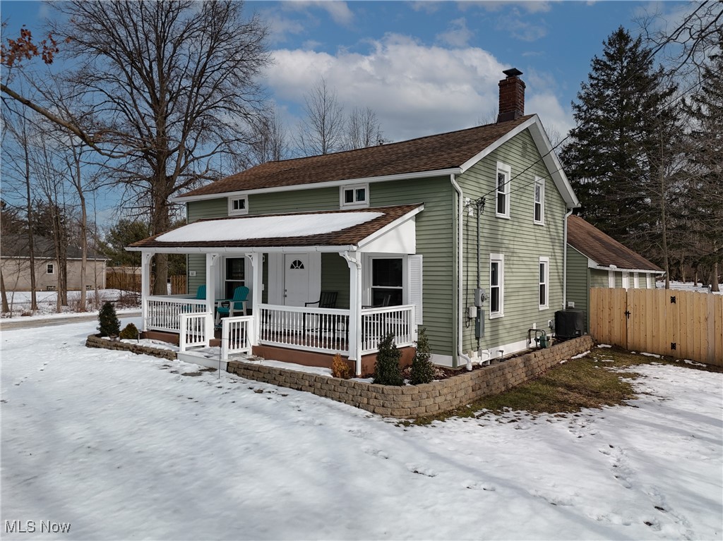 61 Marks Road Brunswick, OH 44212 - Photo 4 of 41 View of front of property featuring cooling unit and covered porch
