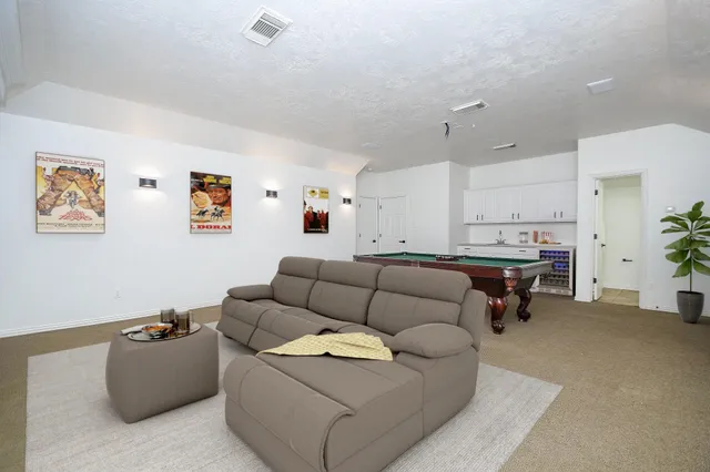 a bedroom with a bed furniture and window