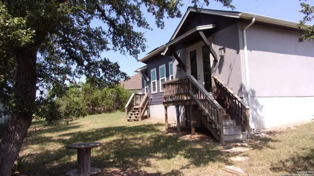 a view of outdoor space and front view of a house