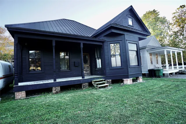 a view of a house with garden