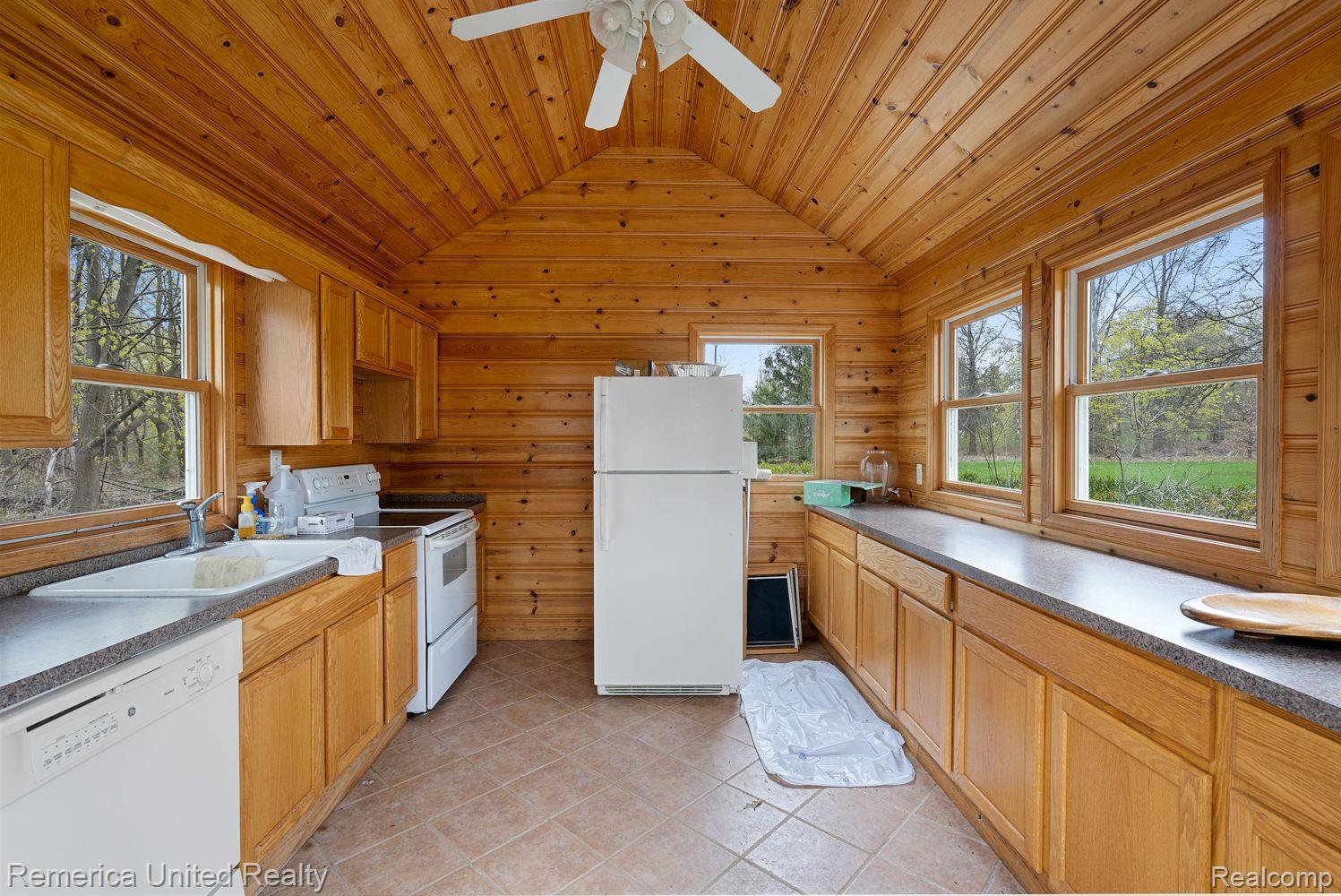 57855 Travis Road New Hudson, MI 48165 - Photo 19 of 55 Outbuilding 2 - Kitchen