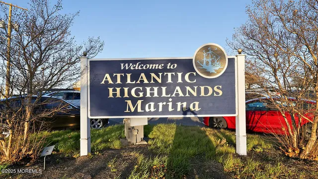 a group of people sitting on top of a wooden floor