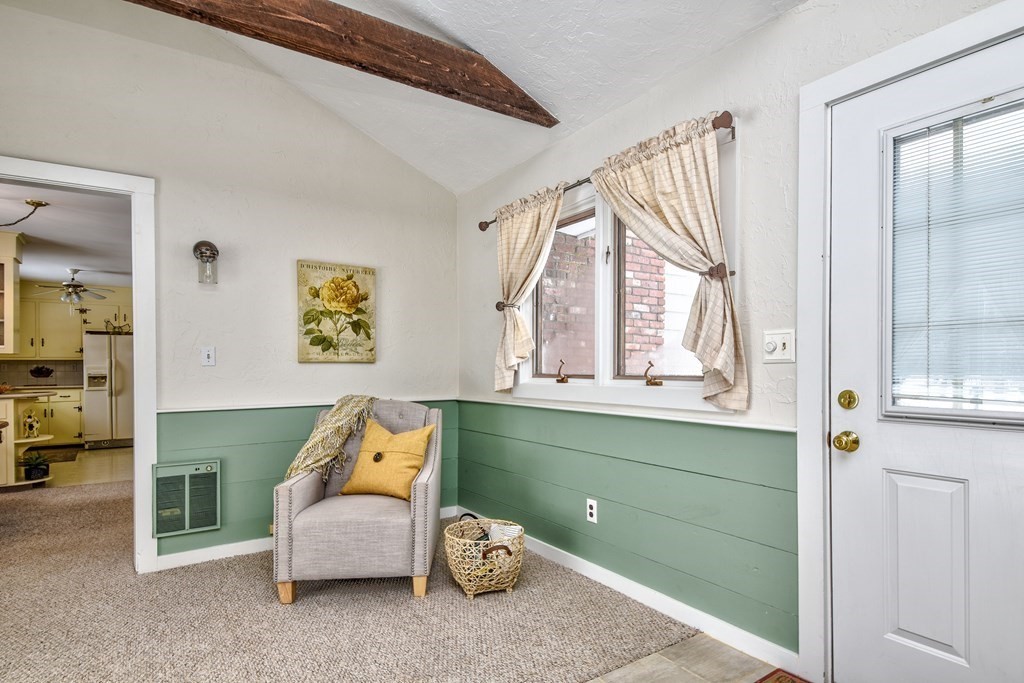 214 Great Road Stow, MA 01775 - Photo 13 of 23 a room with furniture and a large window