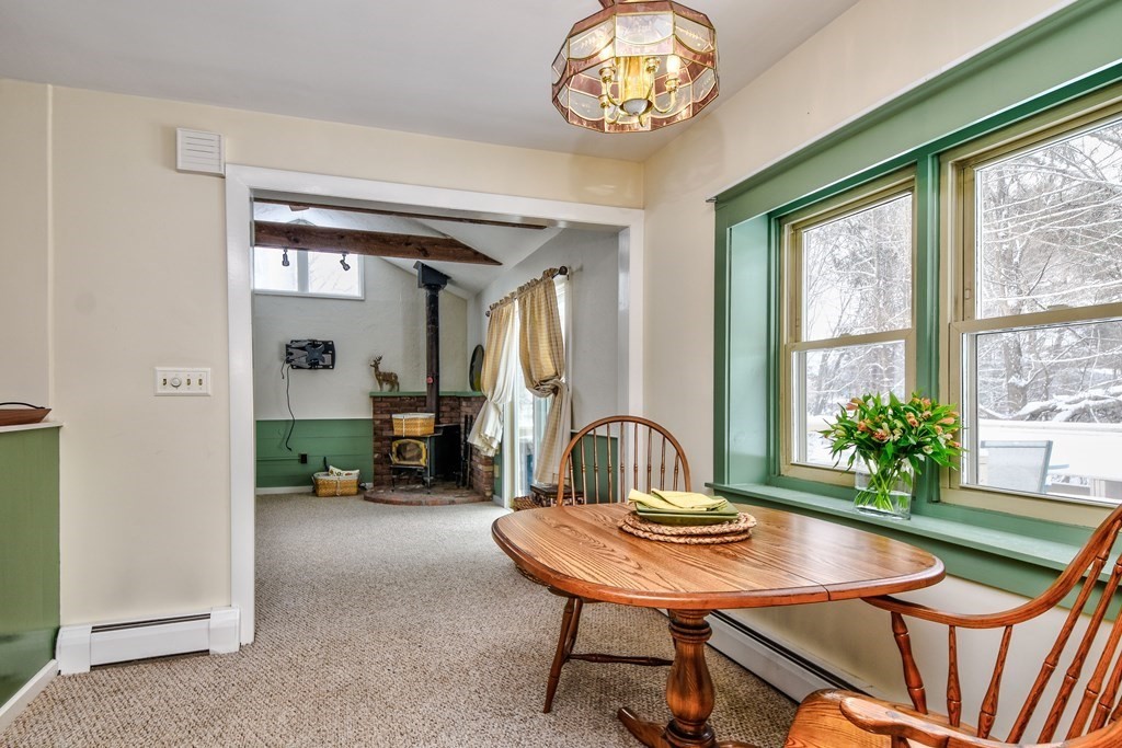 214 Great Road Stow, MA 01775 - Photo 6 of 23 a view of a dining room with furniture window and outside view