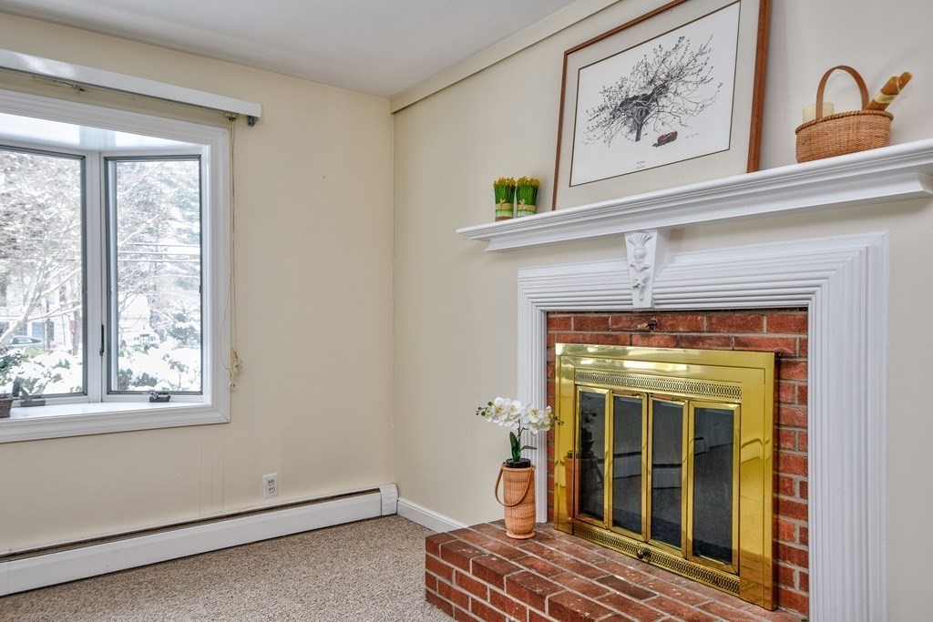 214 Great Road Stow, MA 01775 - Photo 10 of 23 a view of a hallway with a window