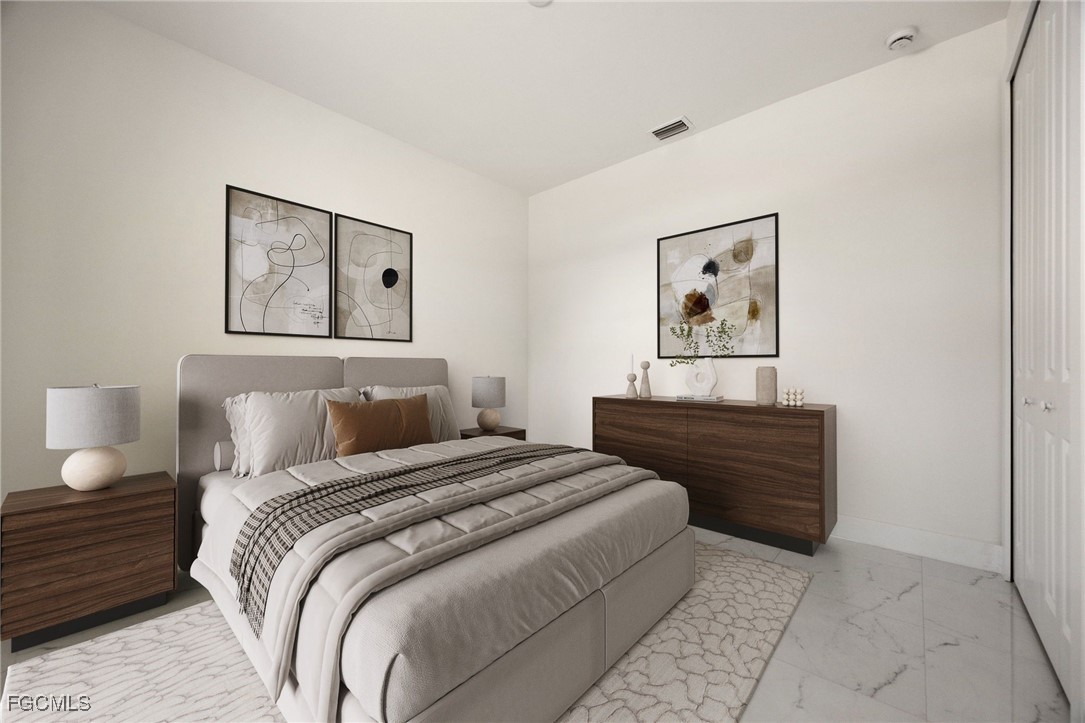 3002 Mercer Way LaBelle, FL 33935 - Photo 23 of 38 a bedroom with a bed and painting on the wall