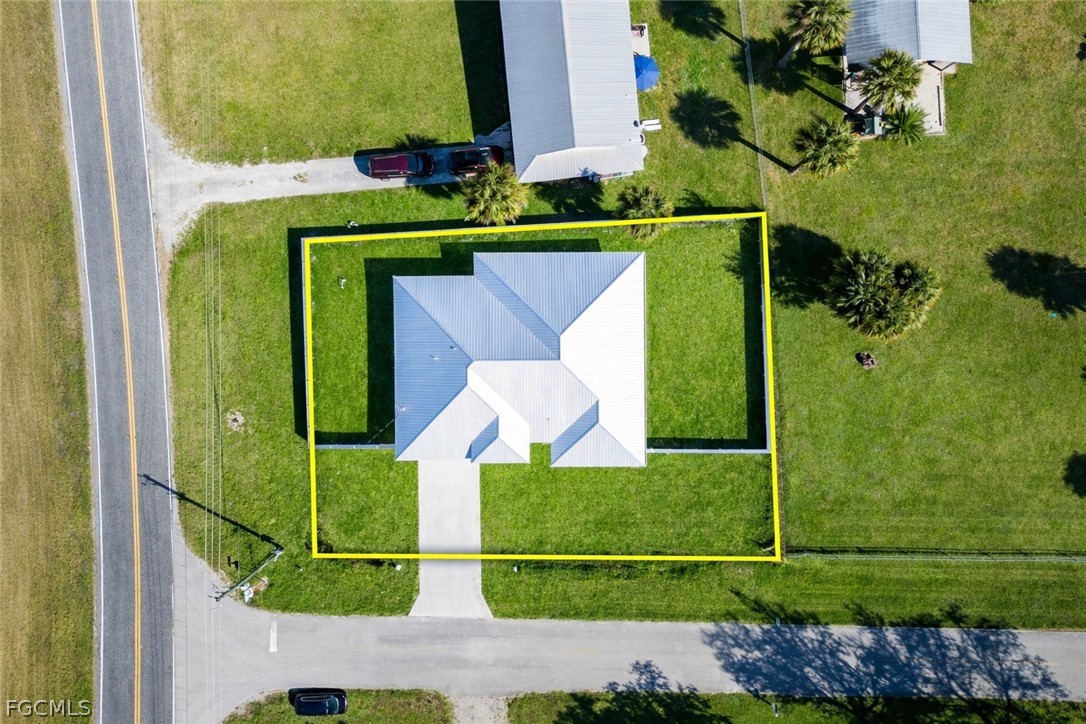 3002 Mercer Way LaBelle, FL 33935 - Photo 31 of 38 a view of swimming pool from a balcony