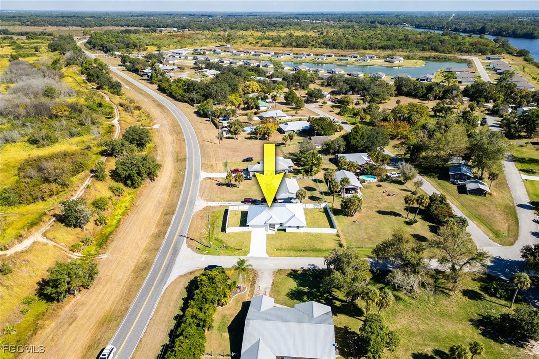 3002 Mercer Way LaBelle, FL 33935 - Photo 33 of 38 an aerial view of residential houses with outdoor space