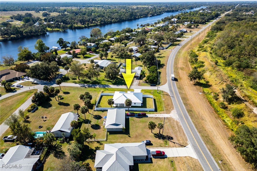 3002 Mercer Way LaBelle, FL 33935 - Photo 35 of 38 an aerial view of houses with outdoor space