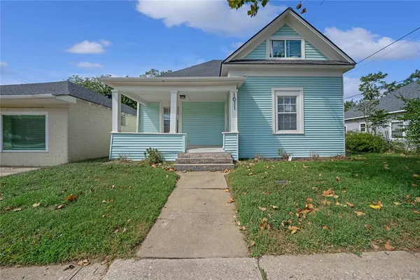 front view of a house and a yard