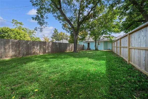a view of a backyard with a garden