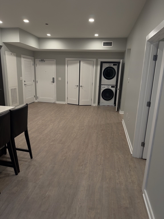 14 Ward Street, Unit 102 Somerville, MA 02143 - Photo 7 of 26 a view of an empty room with a fireplace