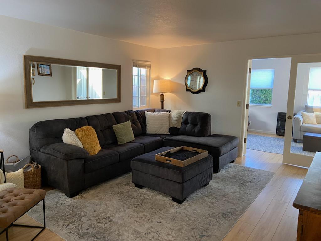 470 Suncrest Way Watsonville, CA 95076 - Photo 5 of 15 a living room with furniture a rug and a window