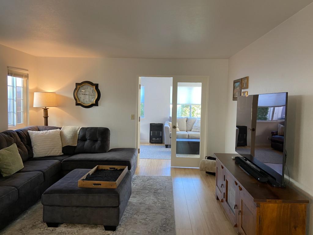 470 Suncrest Way Watsonville, CA 95076 - Photo 6 of 15 a living room with furniture and a flat screen tv