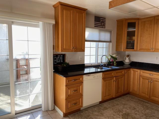470 Suncrest Way Watsonville, CA 95076 - Photo 8 of 15 a kitchen with granite countertop a sink stainless steel appliances and cabinets