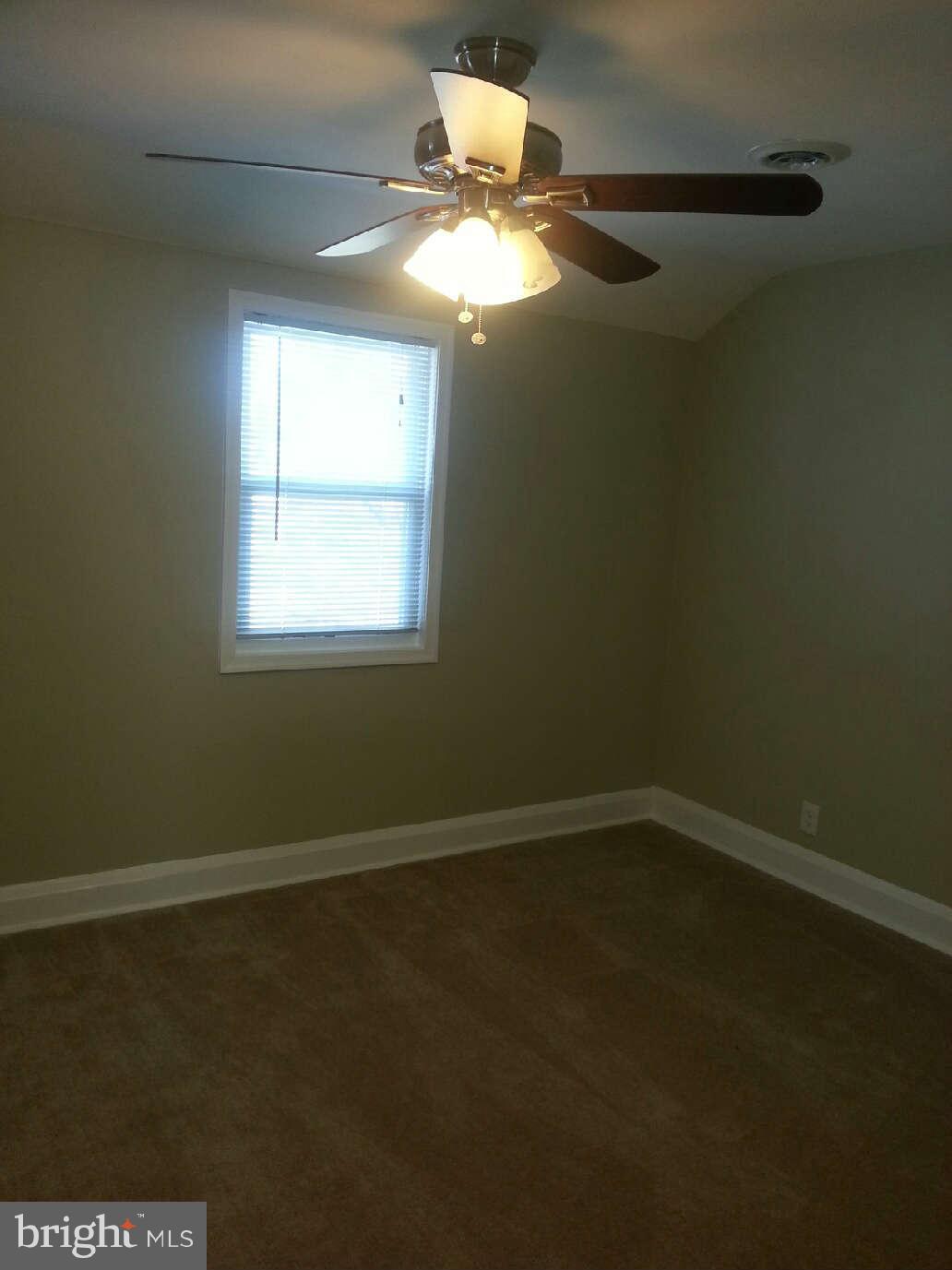 414 North Bend Road Baltimore, MD 21229 - Photo 11 of 27 an empty room with a window