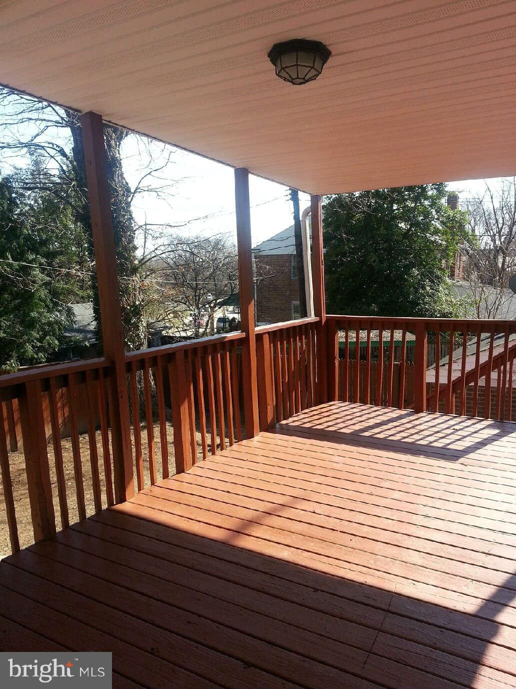 414 North Bend Road Baltimore, MD 21229 - Photo 15 of 27 a view of balcony and wooden floor