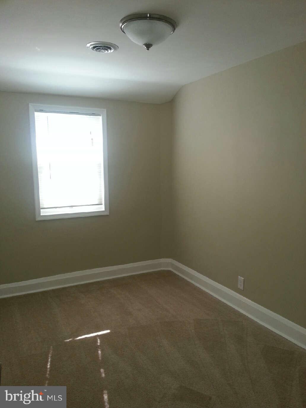414 North Bend Road Baltimore, MD 21229 - Photo 10 of 27 an empty room with a window